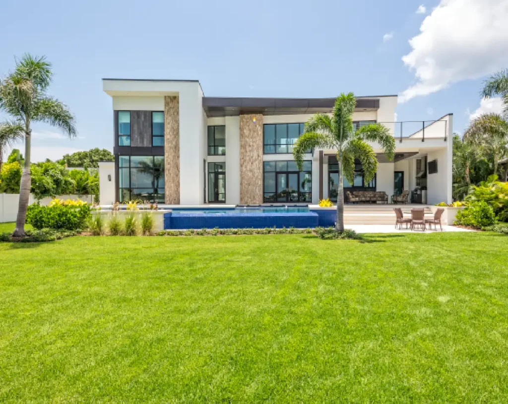 Luxurious villa with lush green lawn