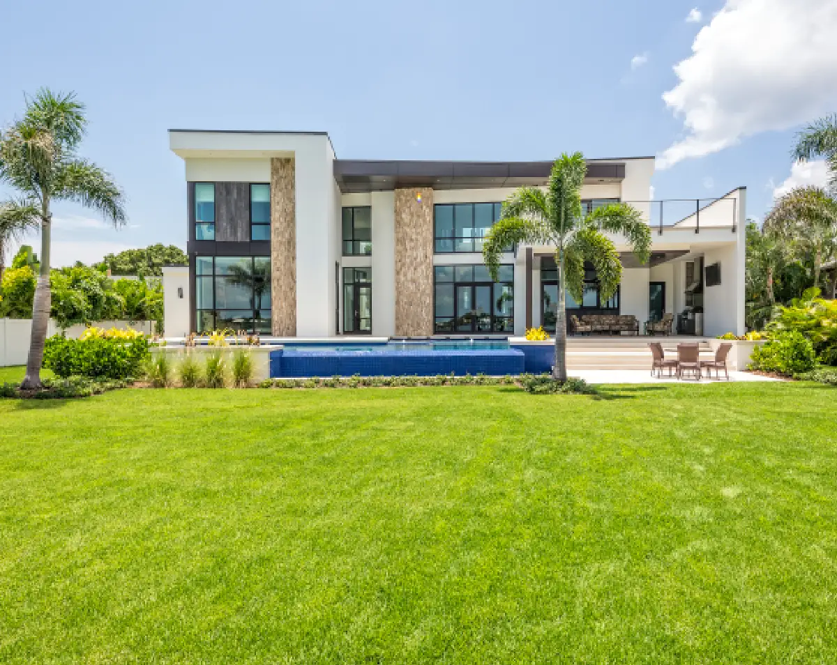 Luxurious villa with lush green lawn