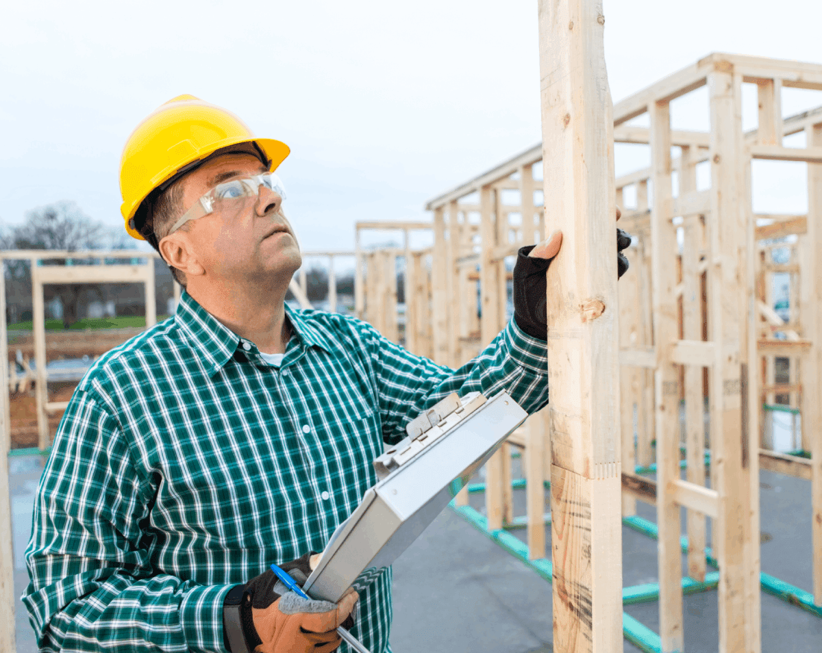 Man in hard hat with clipboard