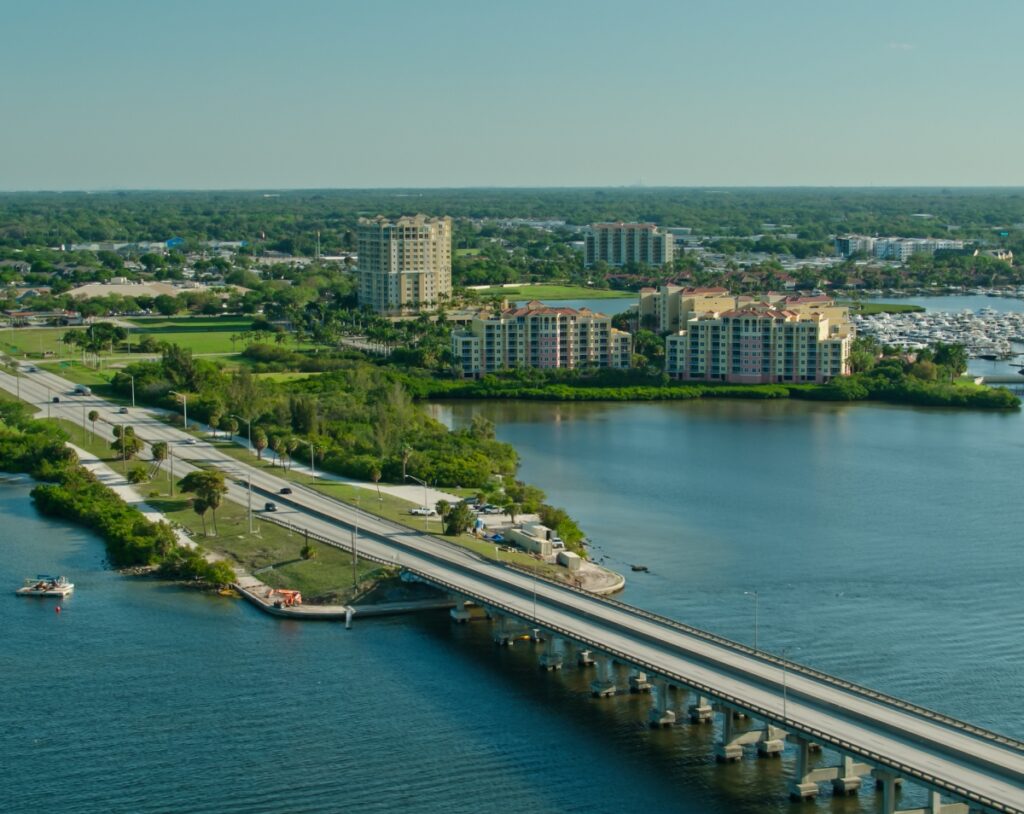 Waterfront city with bridge and buildings